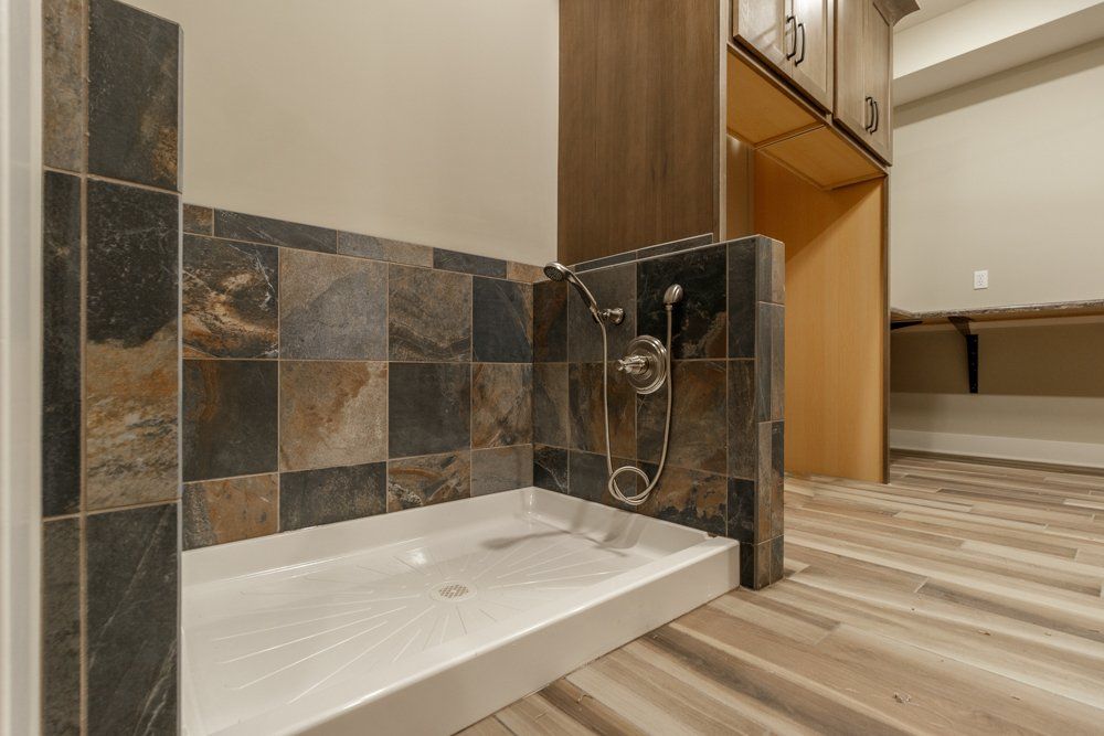 A Modern Bathroom Designed in Mid-Missouri by Hansman Custom Homes Contractors