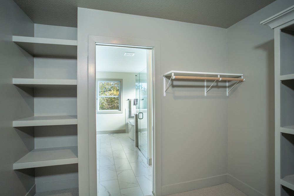 Built-in Shelves Leading to Bedroom by Hansman Custom Homes in Mid-MO