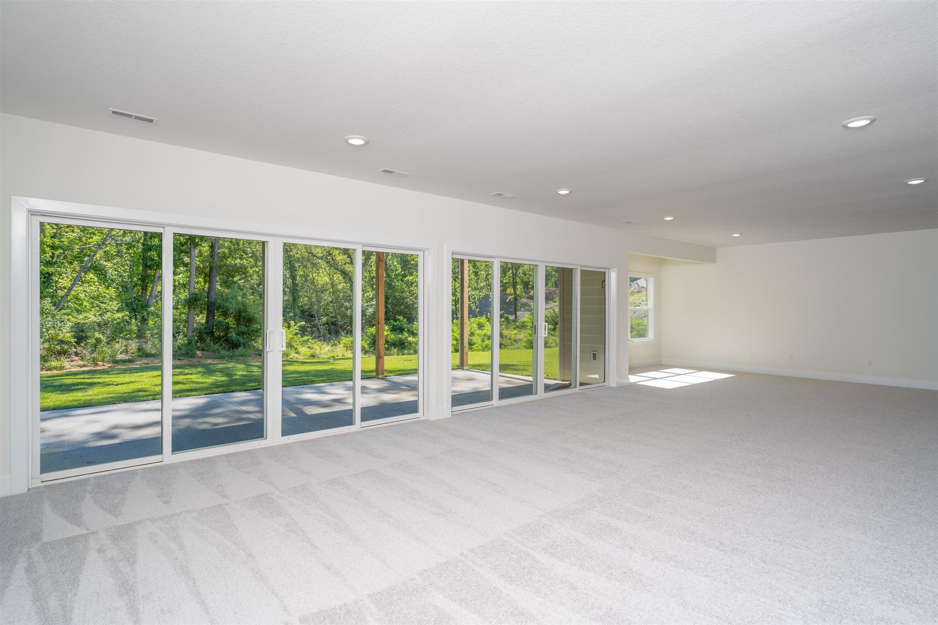 A Spacious Basement Lined With Windows, Created by Hansman Custom Homes in the Columbia, MO Area
