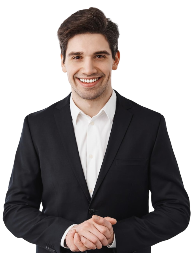 A man in a suit and white shirt is smiling and holding his hands together.