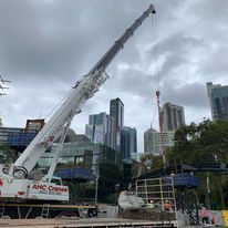 Large ANC crane lifting a large object in Sydney