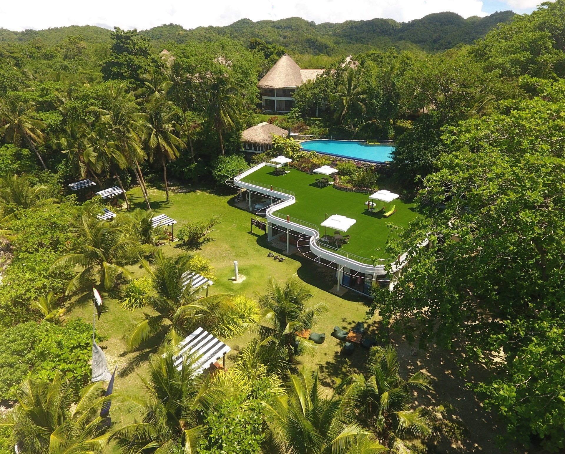 Amun Ini terrace with ocean views and tropical greenery in Bohol.