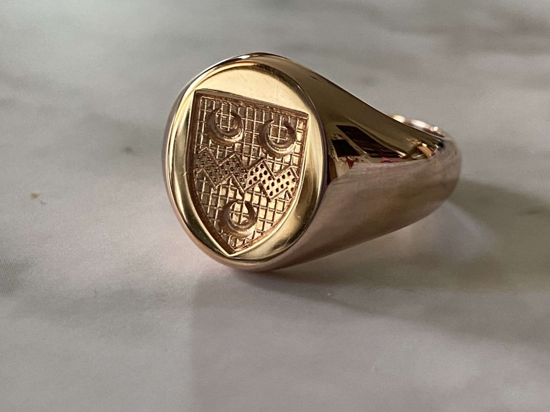 silver and gold cad signet rings