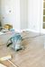 A vacuum cleaner is sitting on the floor in a room under construction.