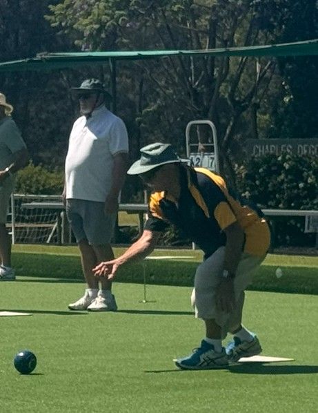A Group of Bowling Balls Sitting on Top of A Lush Green Field — Pacific Palms Bowling Club In Smiths Lake, NSW