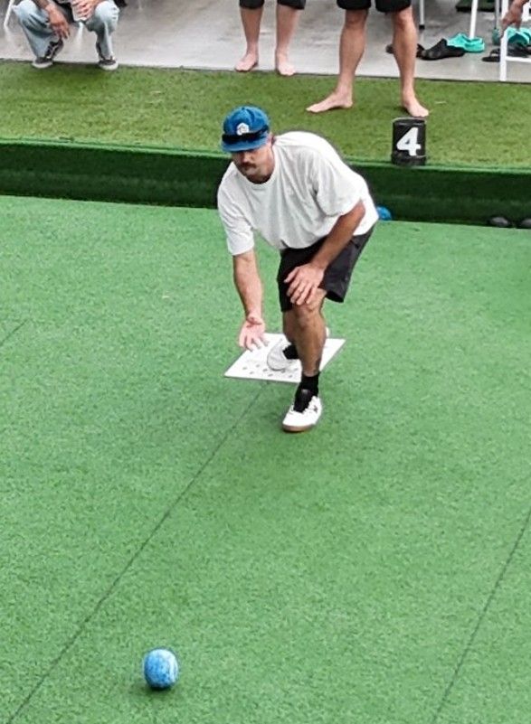 A Group of Bowling Balls Sitting on Top of A Lush Green Field — Pacific Palms Bowling Club In Smiths Lake, NSW
