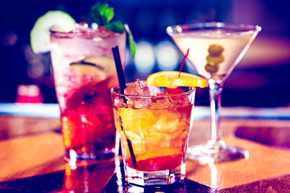 Three Different Types Of Cocktails Are Sitting On A Bar — Pacific Palms Bowling Club In Smiths Lake, NSW