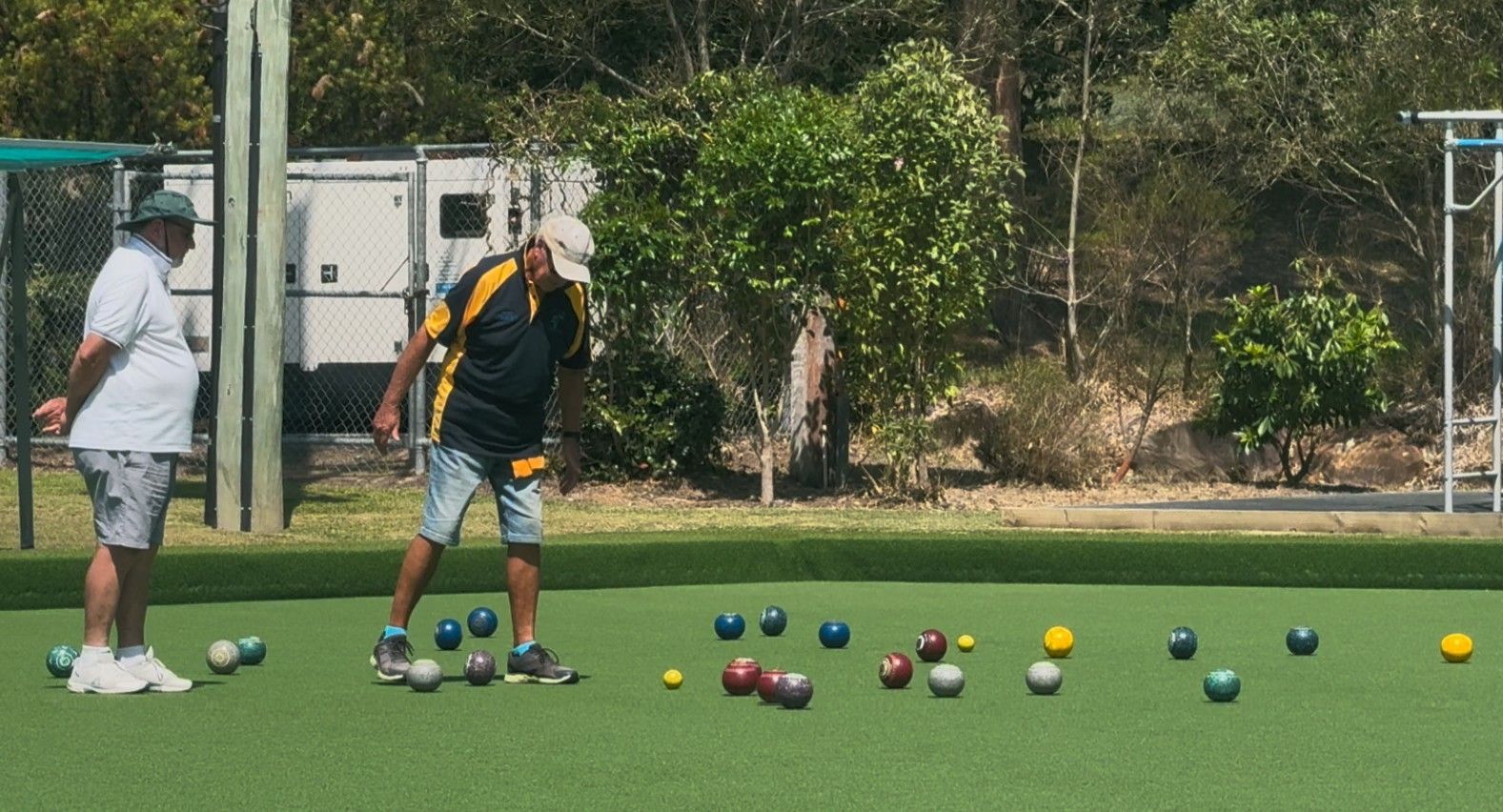 A Group Of People Are Playing A Game Of Bowling On A Lush Green Field  — Pacific Palms Bowling Club In Smiths Lake, NSW