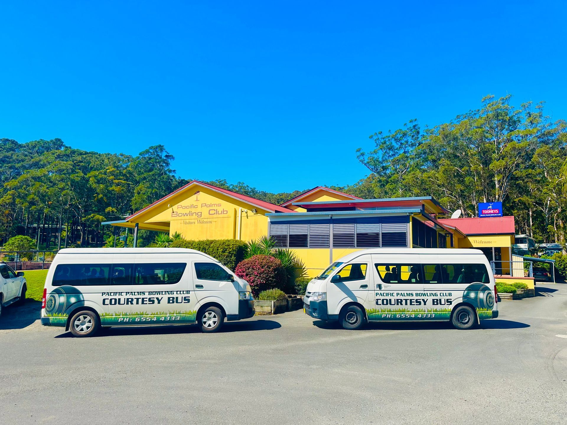 Courtesy Busses Outside The Bowls Club — Pacific Palms Bowling Club In Smiths Lake, NSW