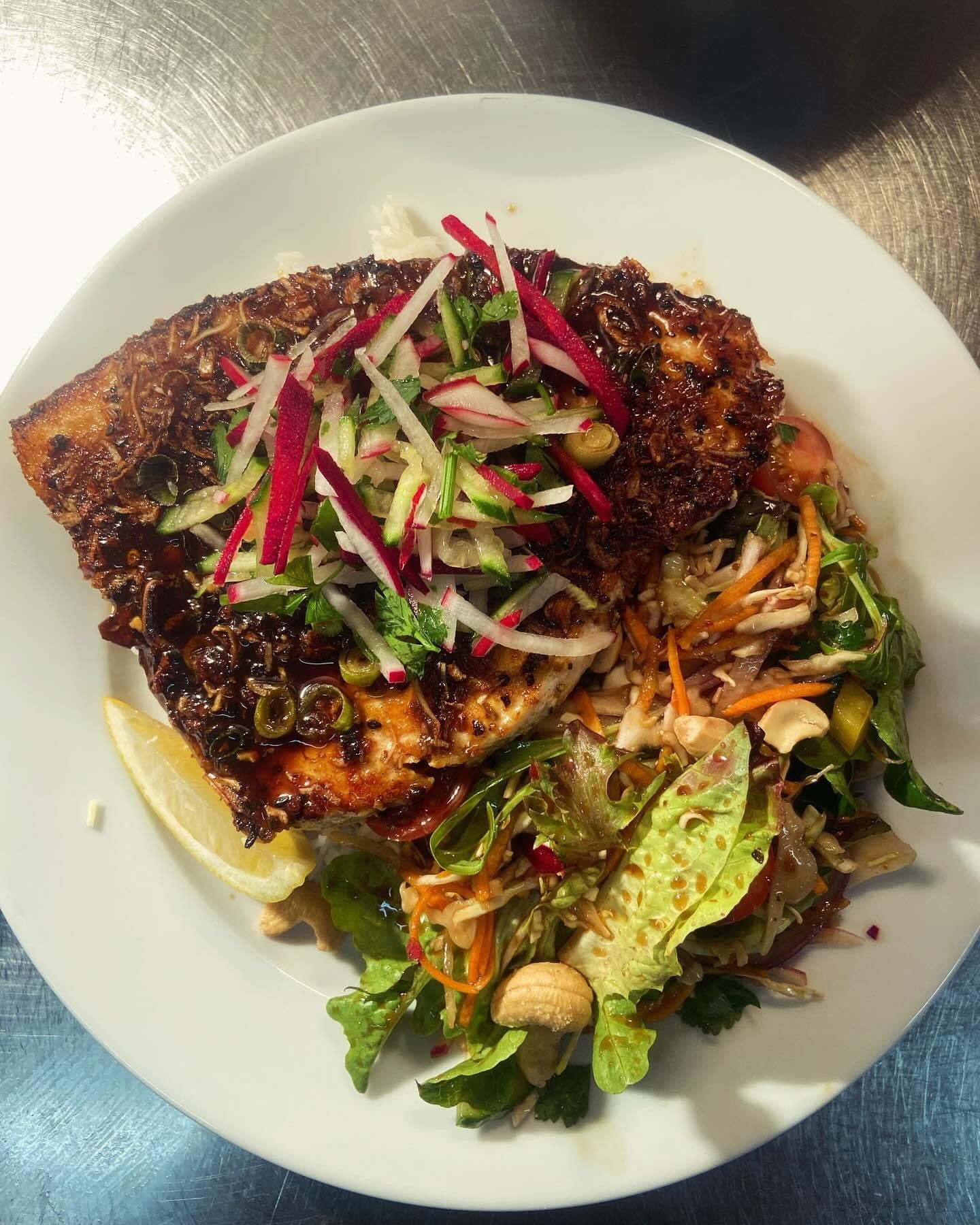 A Hamburger And French Fries Are On A Table — Pacific Palms Bowling Club In Smiths Lake, NSW
