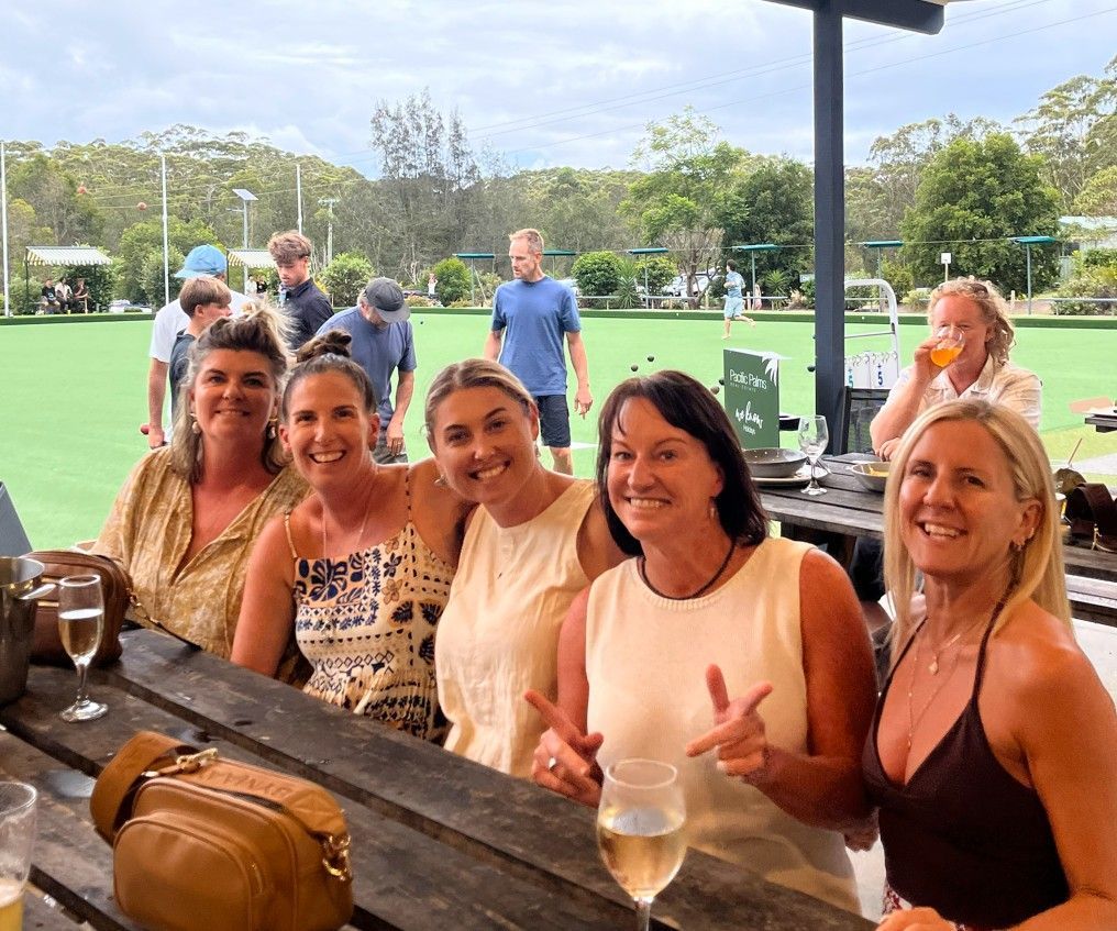 A Group Of Men Are Standing Next To Each Other In A Room — Pacific Palms Bowling Club In Smiths Lake, NSW