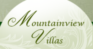 Mountainview Villas logo in green script on a light green and white background.