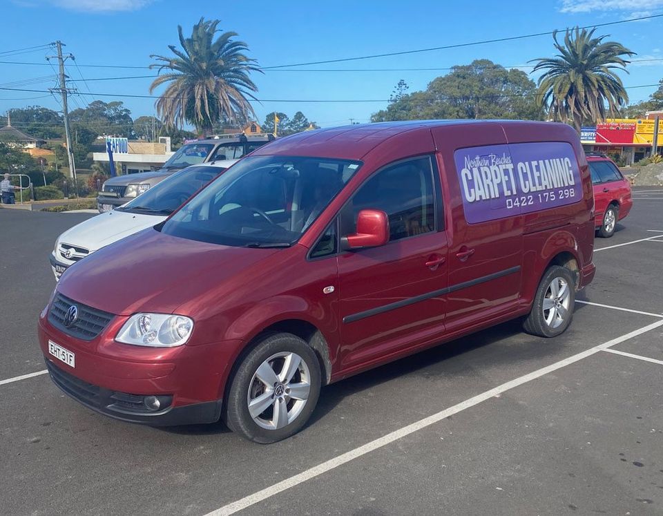 Car With Business Signage — in Woolgoolga, NSW