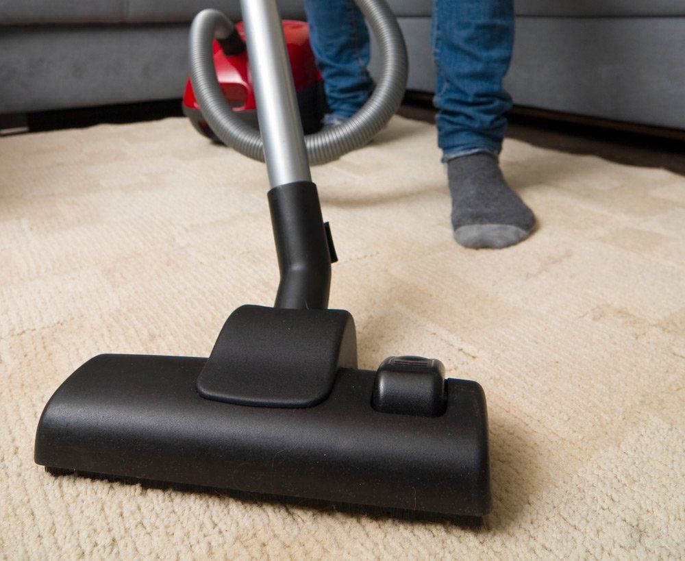 Vacuum Cleaning The Carpet — Carpet Cleaning in Coffs Harbour