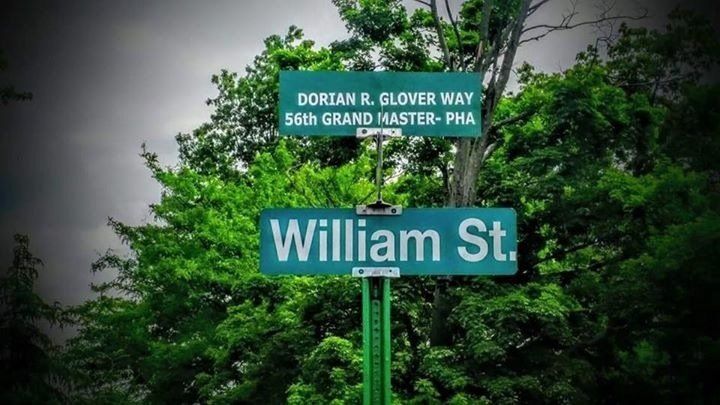 picture of road sign saying Dorian R. Glover Way