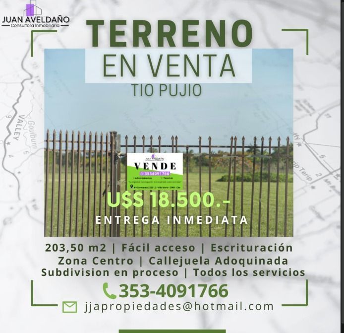 Anuncio inmobiliario de terreno en Tío Pujio, Argentina. Presenta un lote cercado con un cartel de 