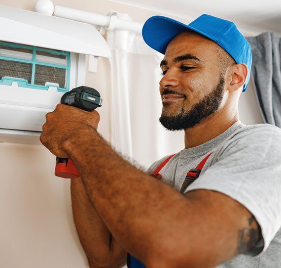 HVAC technician working on a mini split