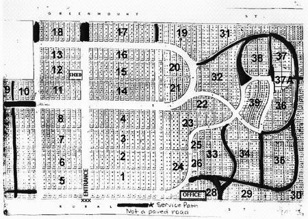 Map of a cemetery with numbered plots and roads. 