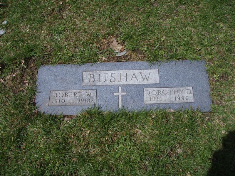 Gray headstone with the name BUSHAW, Robert W. (1910-1980), Dorothy D. (1915-1996), and a cross.