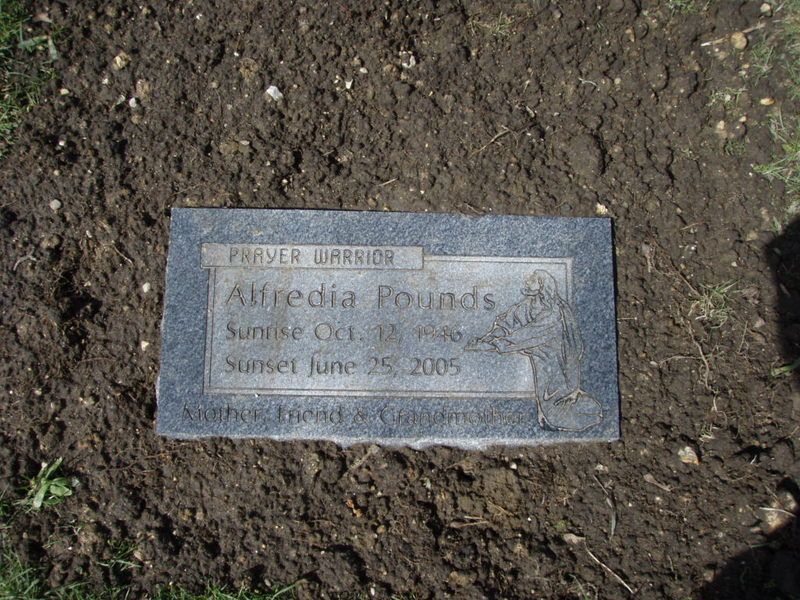 Headstone for Alfredia Pounds in dirt; dates Oct 12, 1940 - June 28, 2005; 