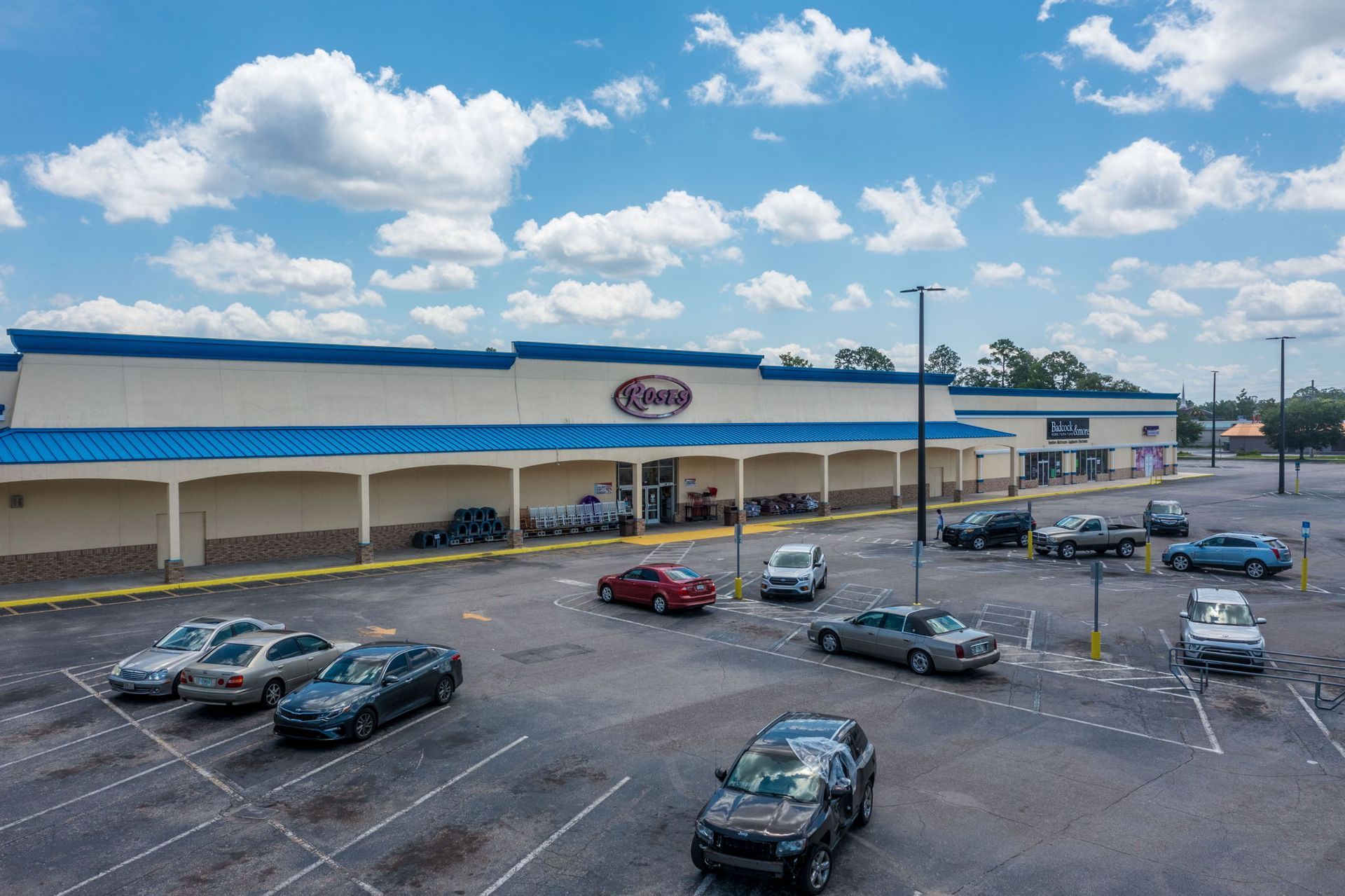 Roses Store Front With Lots Of Parked Cars — Jacksonville, FL — Hatchett Electrical Contracting