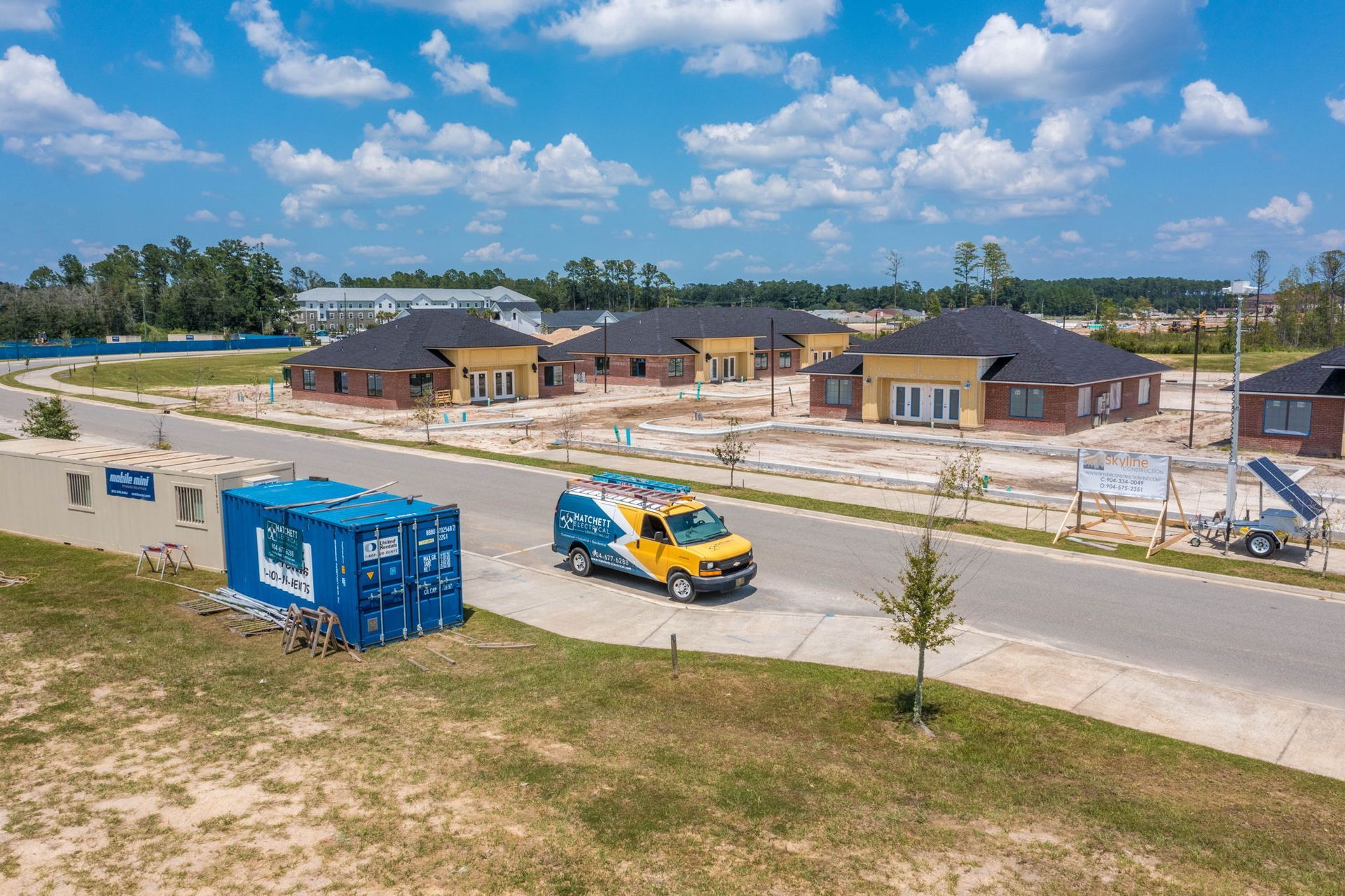 Clay Town Center Shot With Blue Container — Jacksonville, FL — Hatchett Electrical Contracting