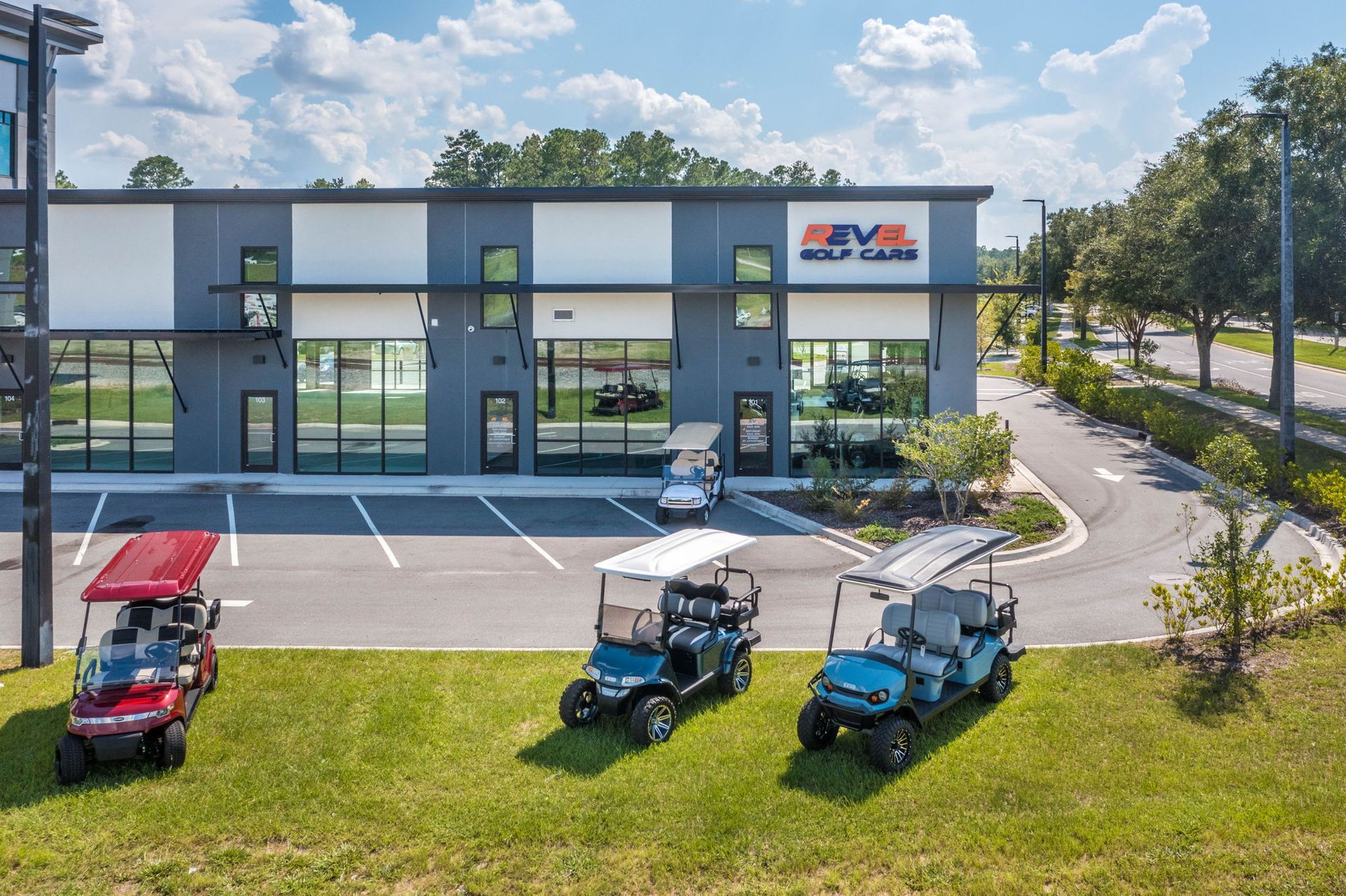 Revel Store Parking With 4 Golf Carts In Front — Jacksonville, FL — Hatchett Electrical Contracting