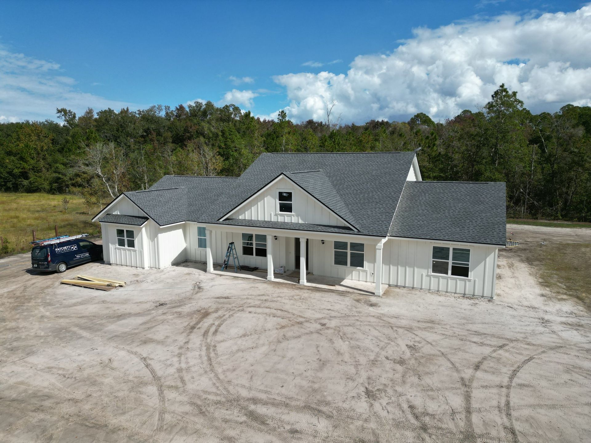 White House With Black Roof — Jacksonville, FL — Hatchett Electrical Contracting