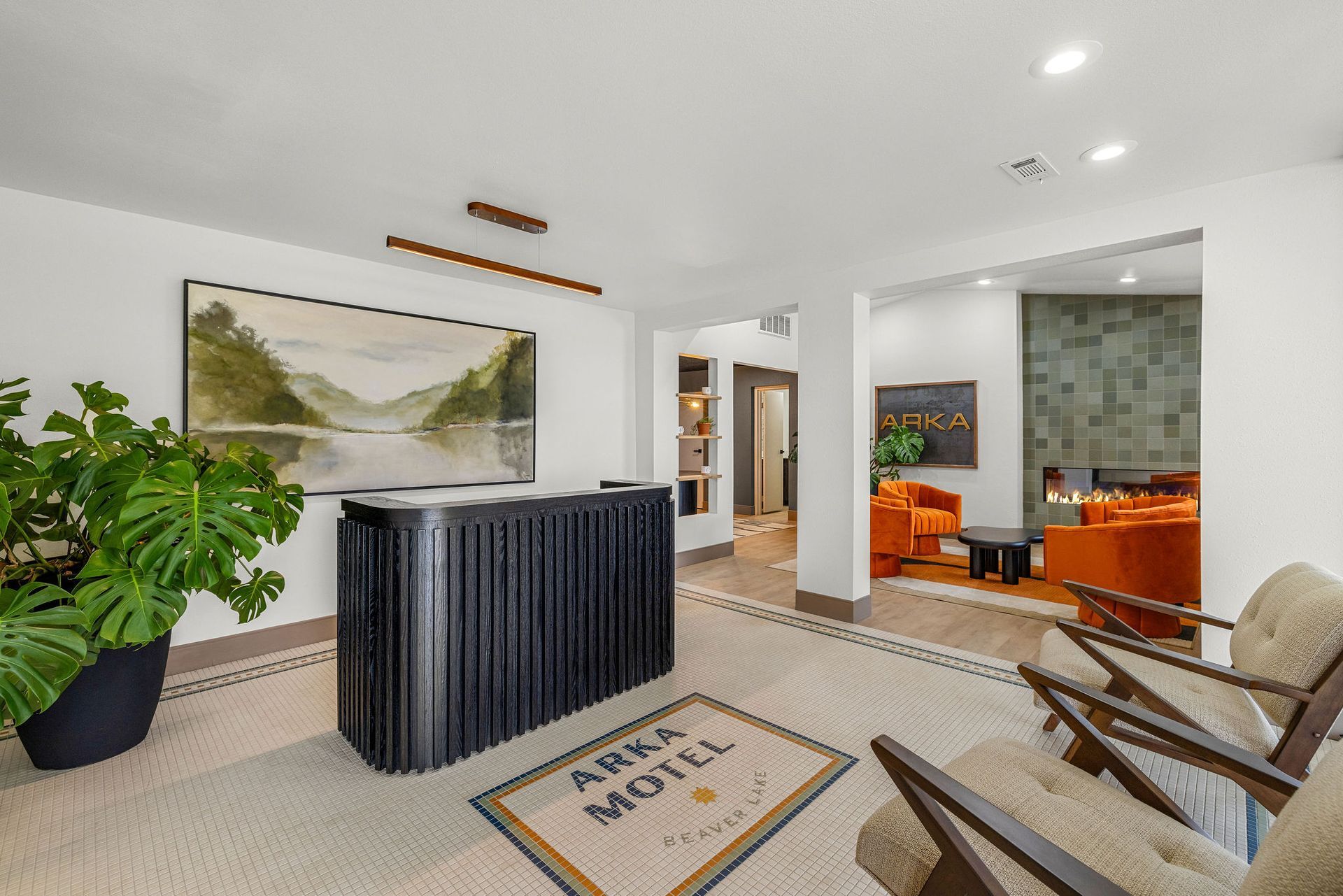 Newly renovated lobby. Check-in desk, and modern furniture. Merch is sold in the back.