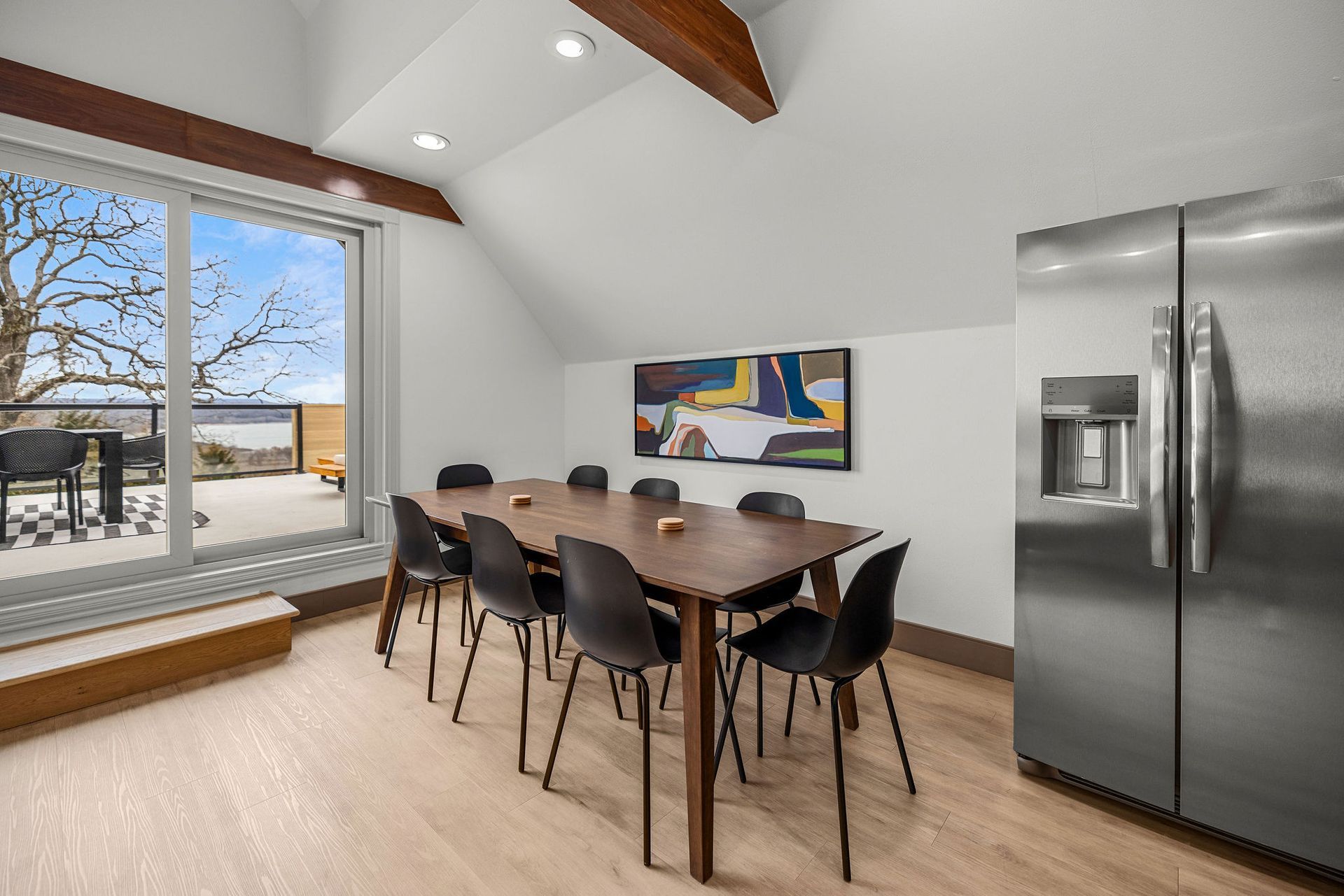 Dining table that seats 8 in the 2 bedroom upstairs unit.