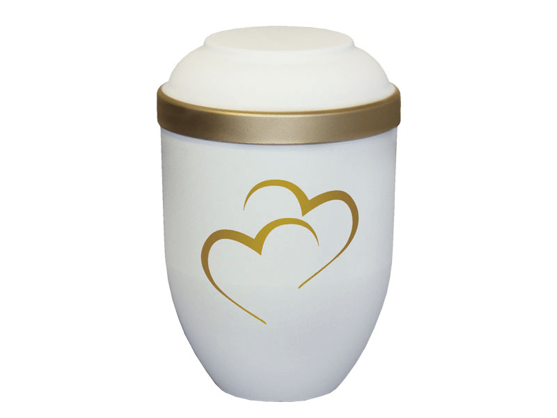 White urn with gold trim and two overlapping gold hearts.