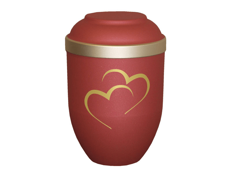Red urn with gold band and intertwined hearts.