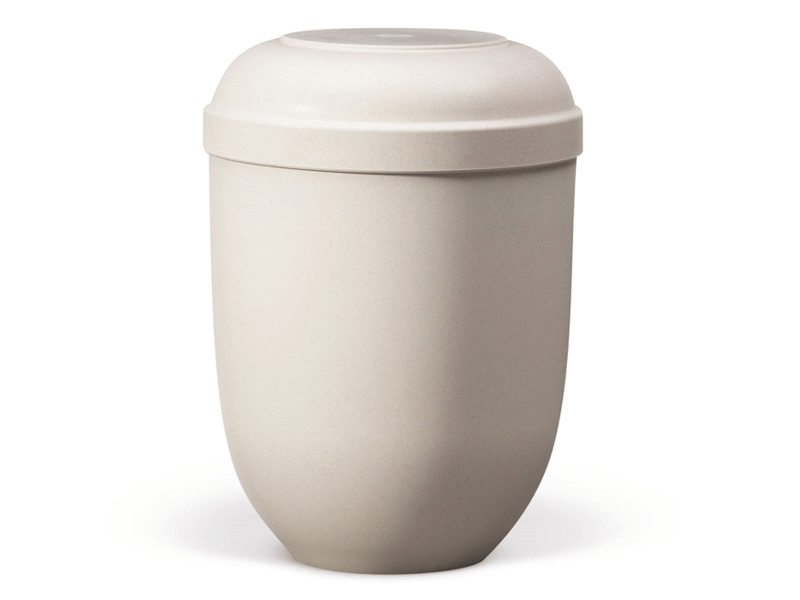 Off-white urn with a rounded shape and a lid, for holding cremated remains.