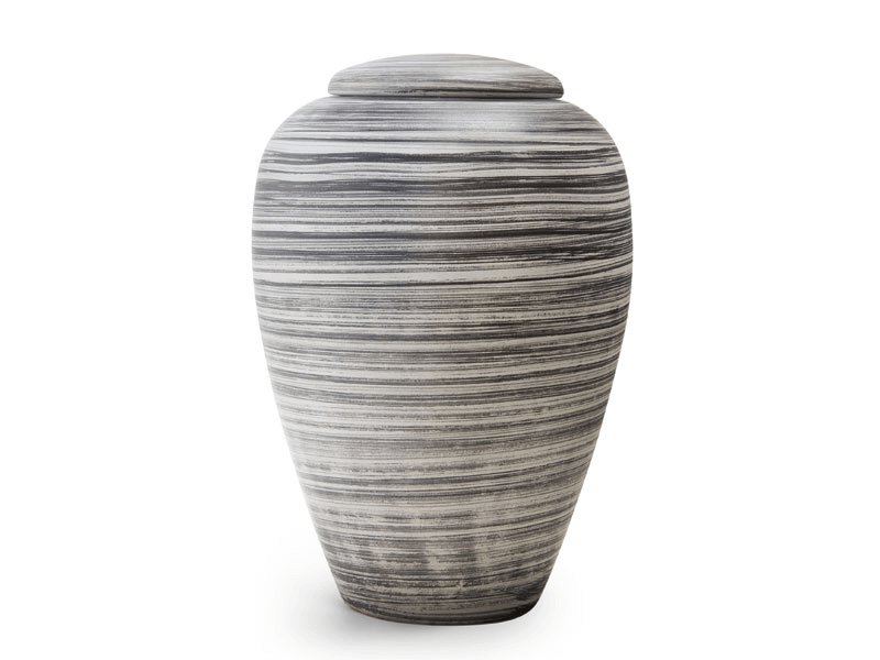 Gray and white striped urn with a lid.