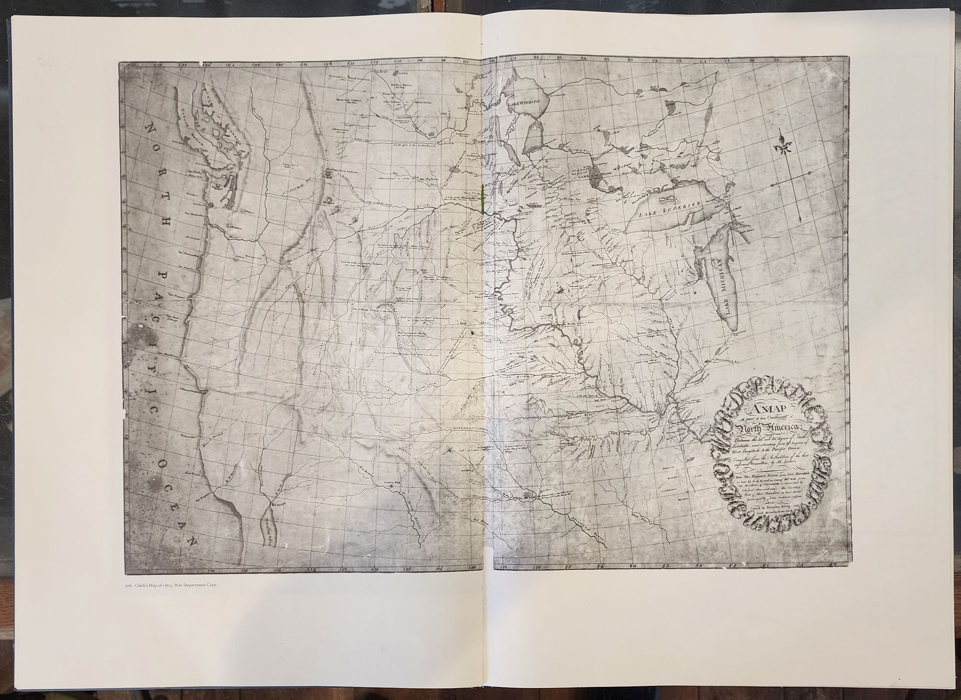 Black-and-white map or chart on a large sheet, with dense markings and a circular inset in the lower right.