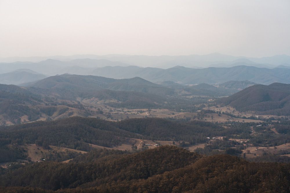 A View of a Valley Surrounded by Mountains and Trees — CBS Chainsaw & Brushcutter Specialists - HUSQVARNA in Comboyne, NSW
