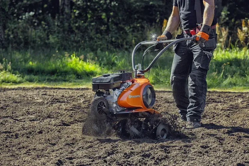 Husqvarna Tiller Digging Up Soil — CBS Chainsaw & Brushcutter Specialists - HUSQVARNA in Wauchope, NSW