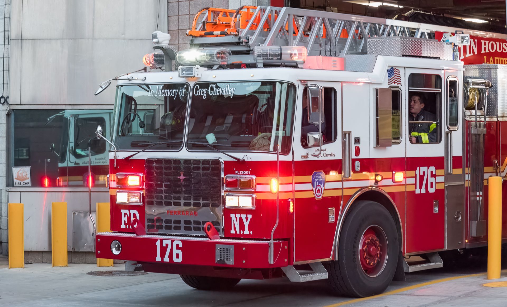 Emergency Management: Photograph of FDNY Ladder 176 responding from quarters