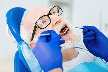 Teeth Bleaching — Old Man Having A Dental Checkup in Greensboro, NC