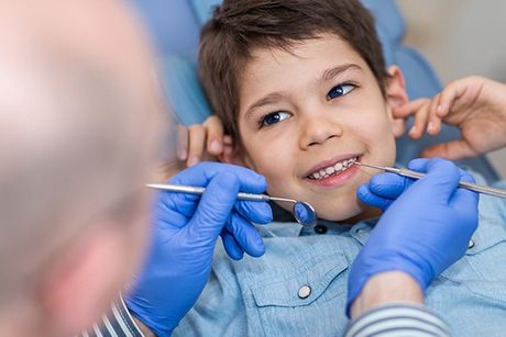 Cosmetic Smile — Young Boy Having His Teeth Checked in Greensboro, NC