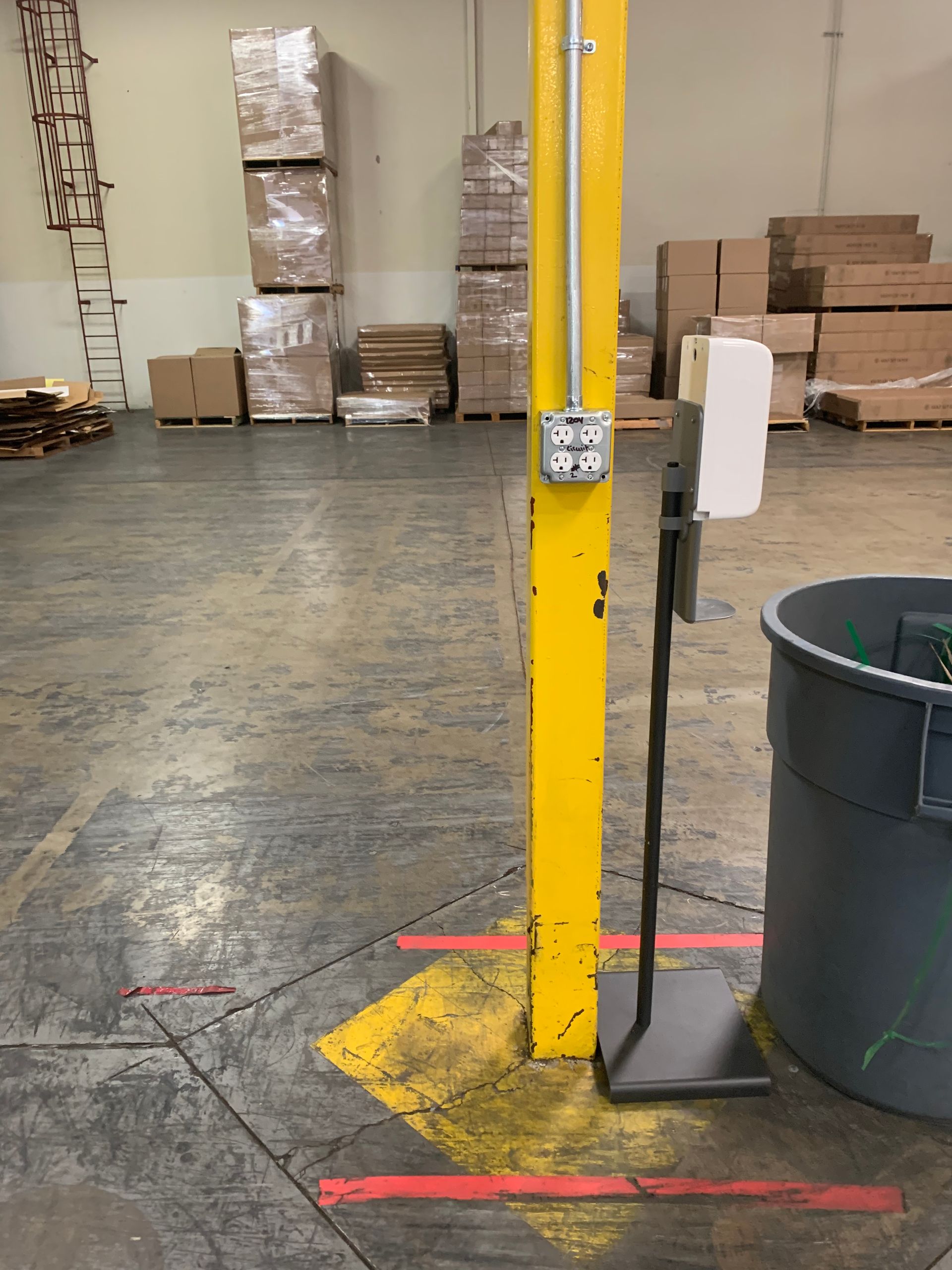 A Yellow Pole Stands Tall Next to A Trash Can | Bloomington, CA | Expressway Electric 