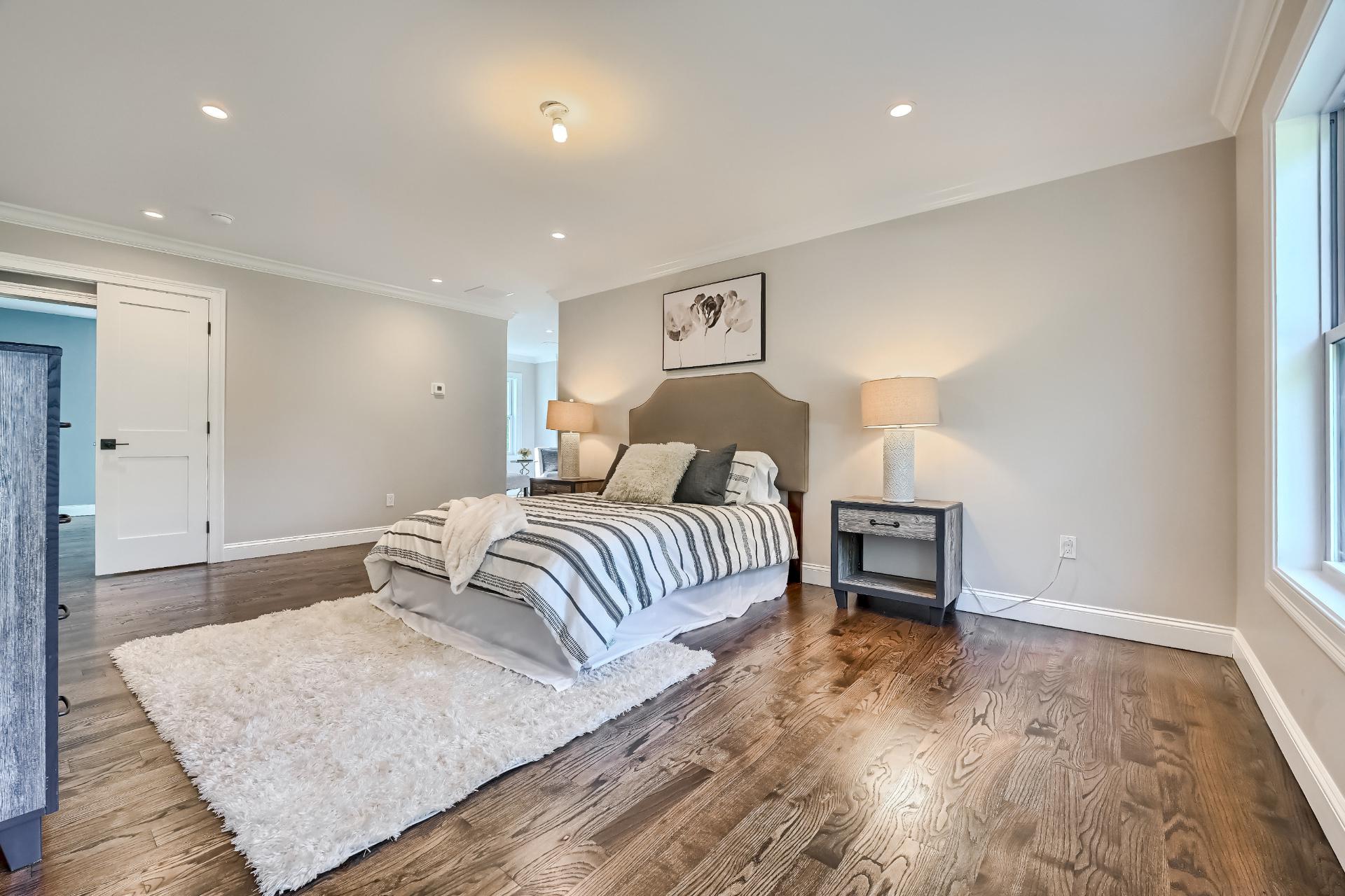 There is a large bed in the middle of the room.