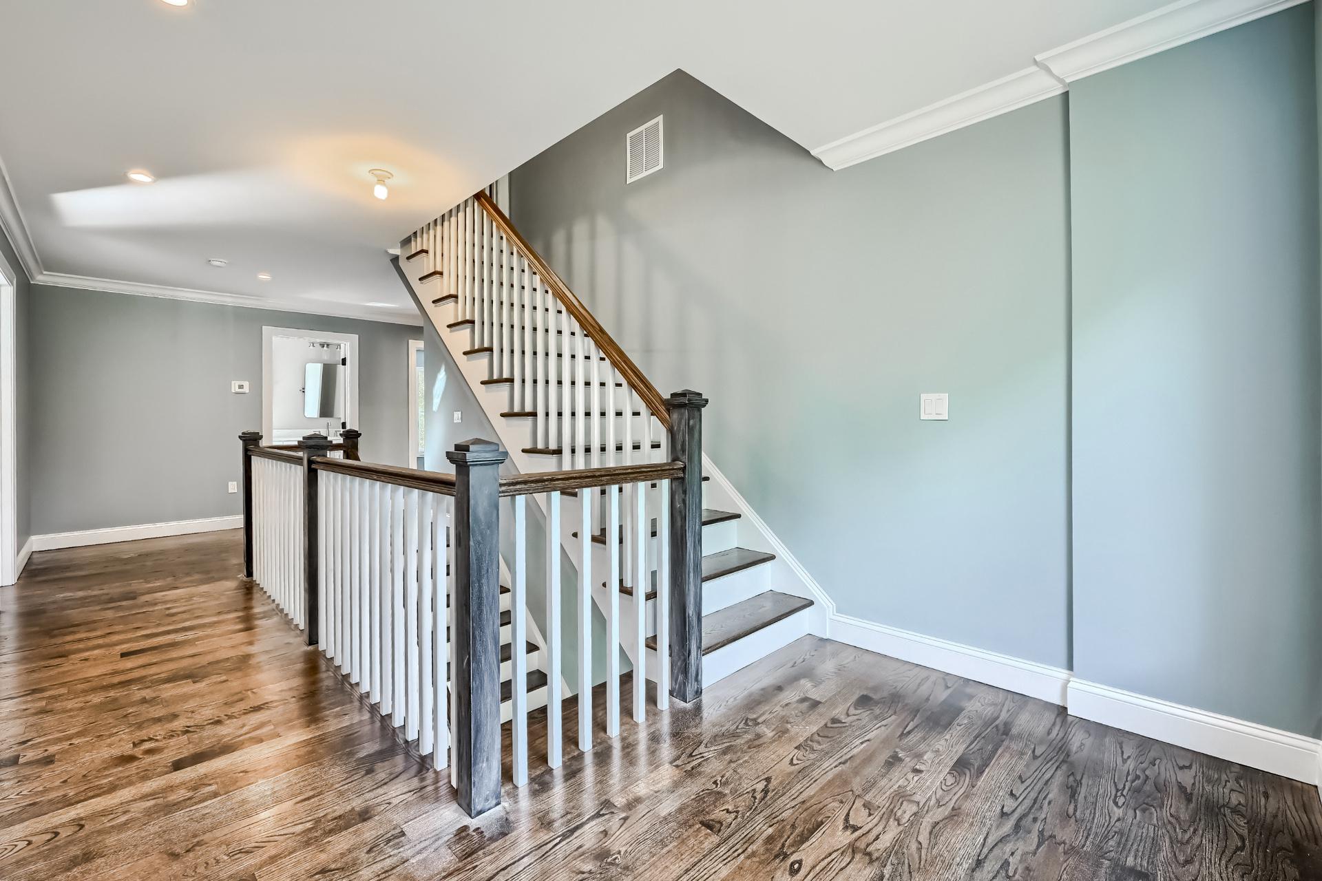 There is a staircase in the middle of the room.