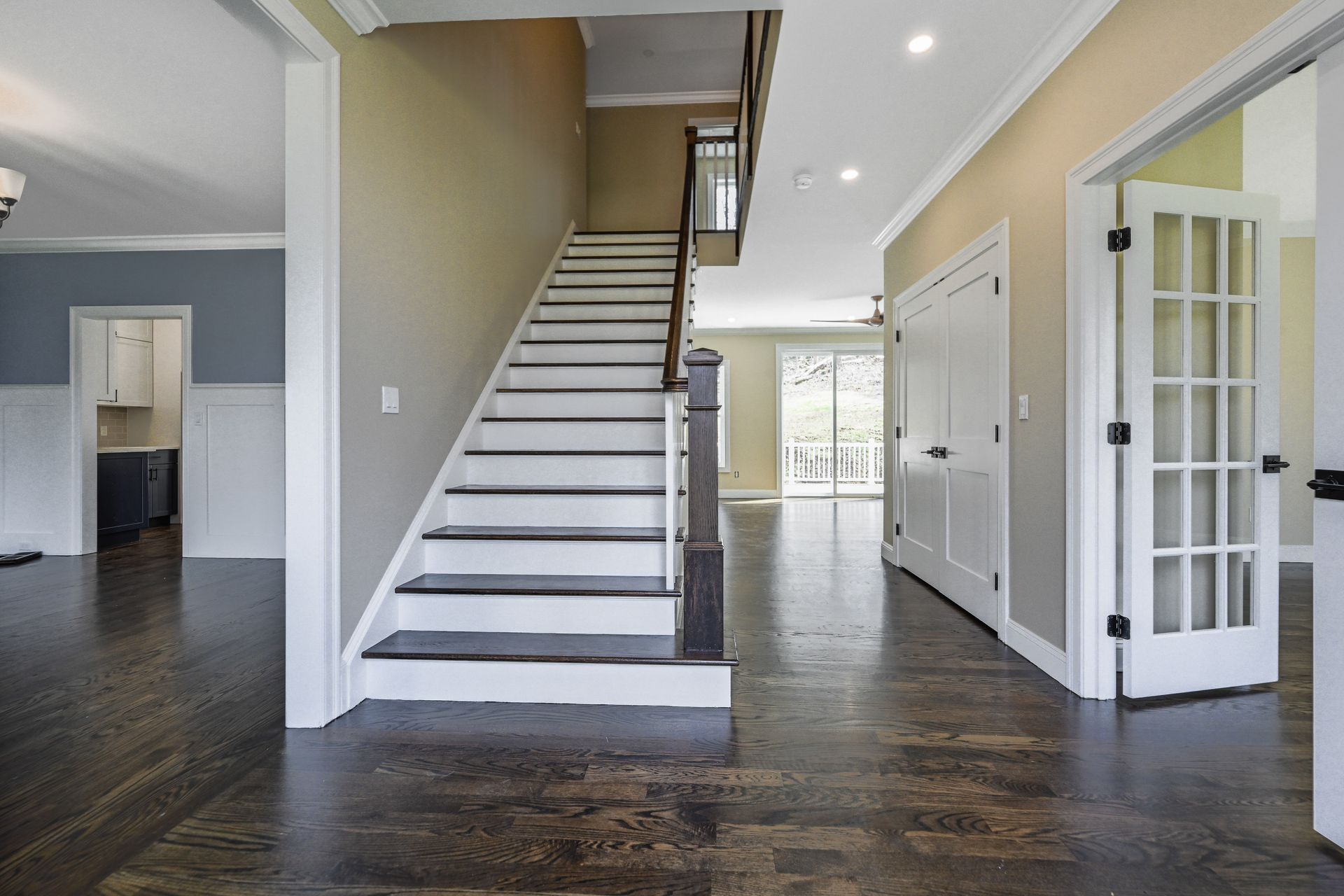 A staircase leading up to the second floor of a house