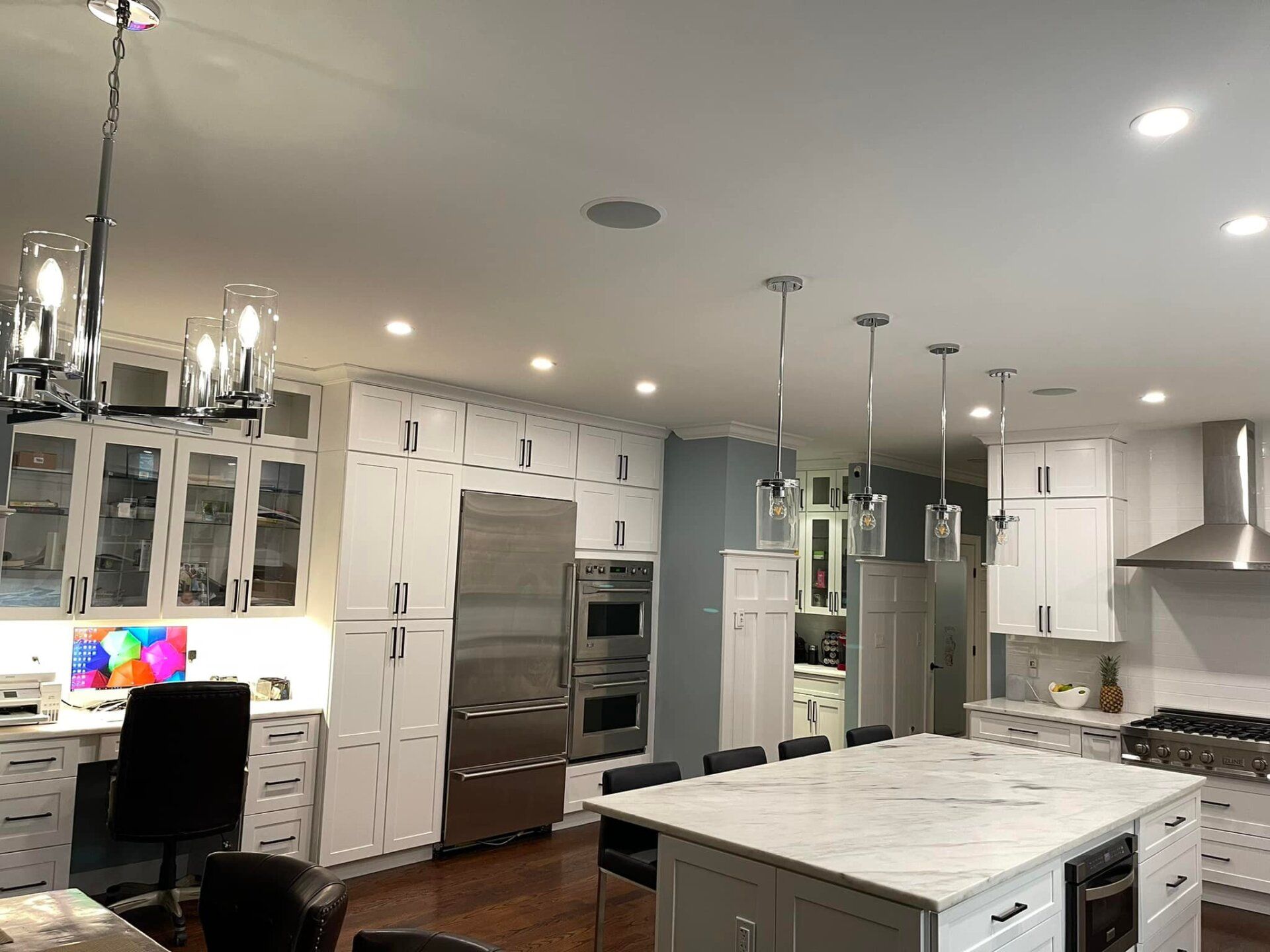 There is a large island in the middle of the kitchen.