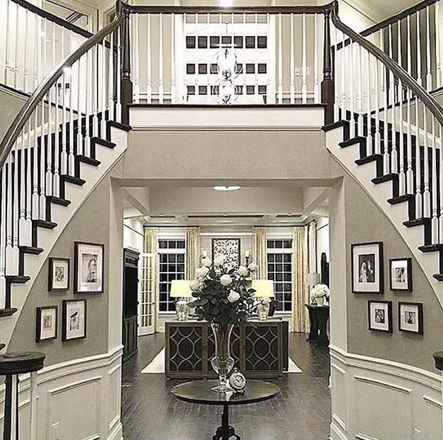A staircase leading up to the second floor of a house