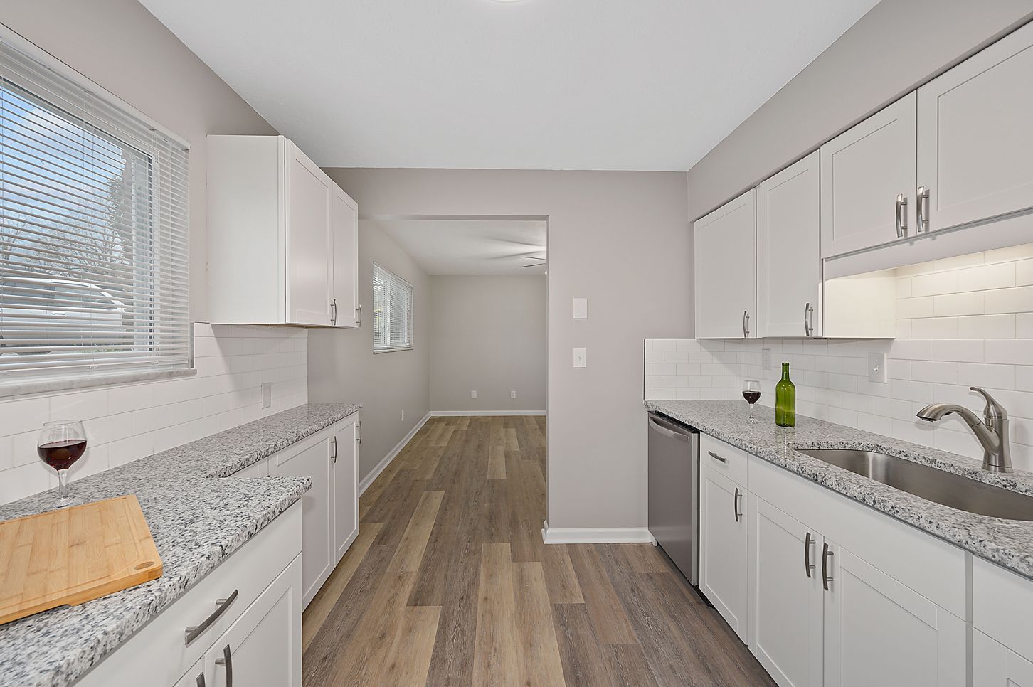 an image of an updated kitchen looking towards the dining room