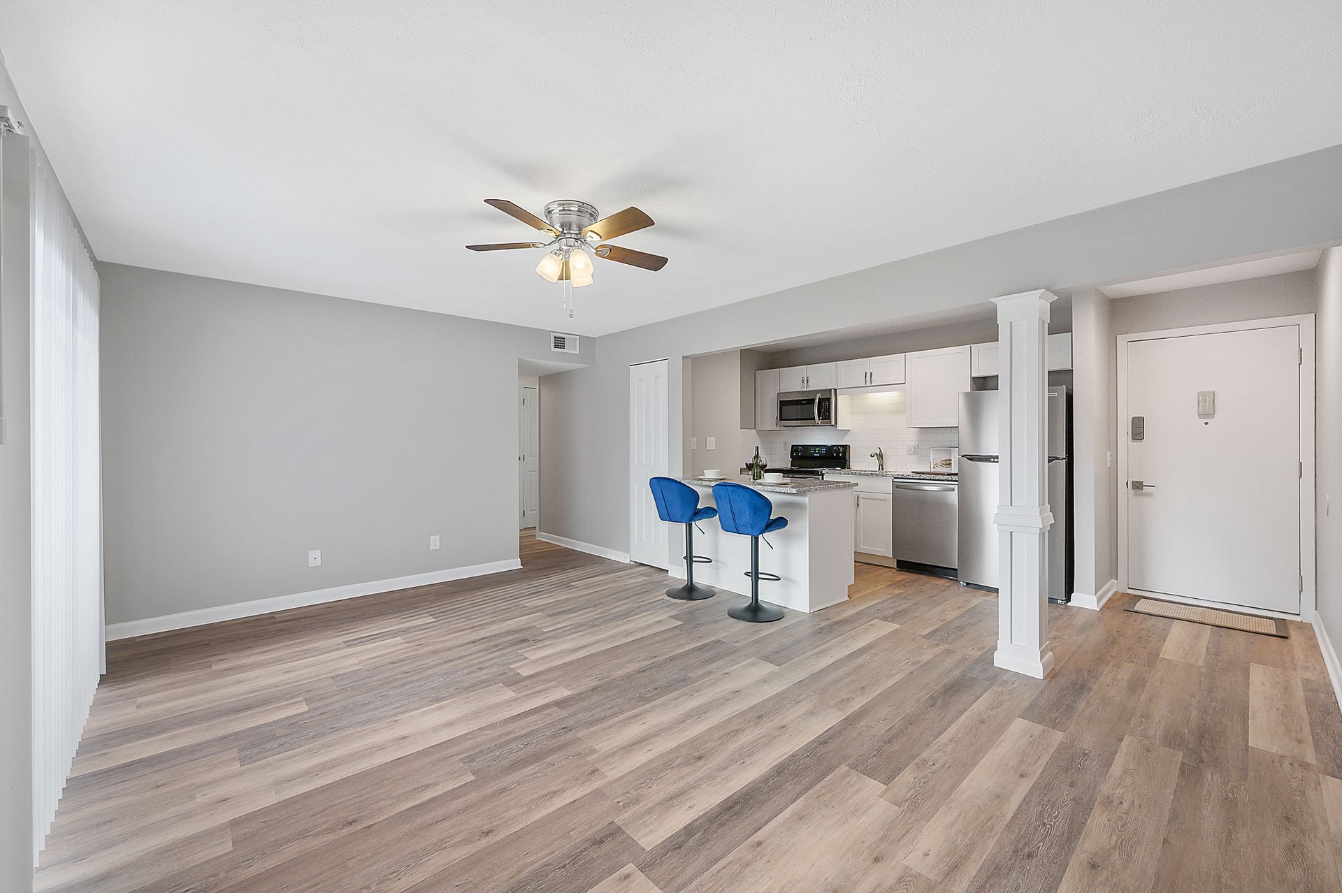 Photo of 8Ninety Open Concept Living Room with Kitchen Barstools