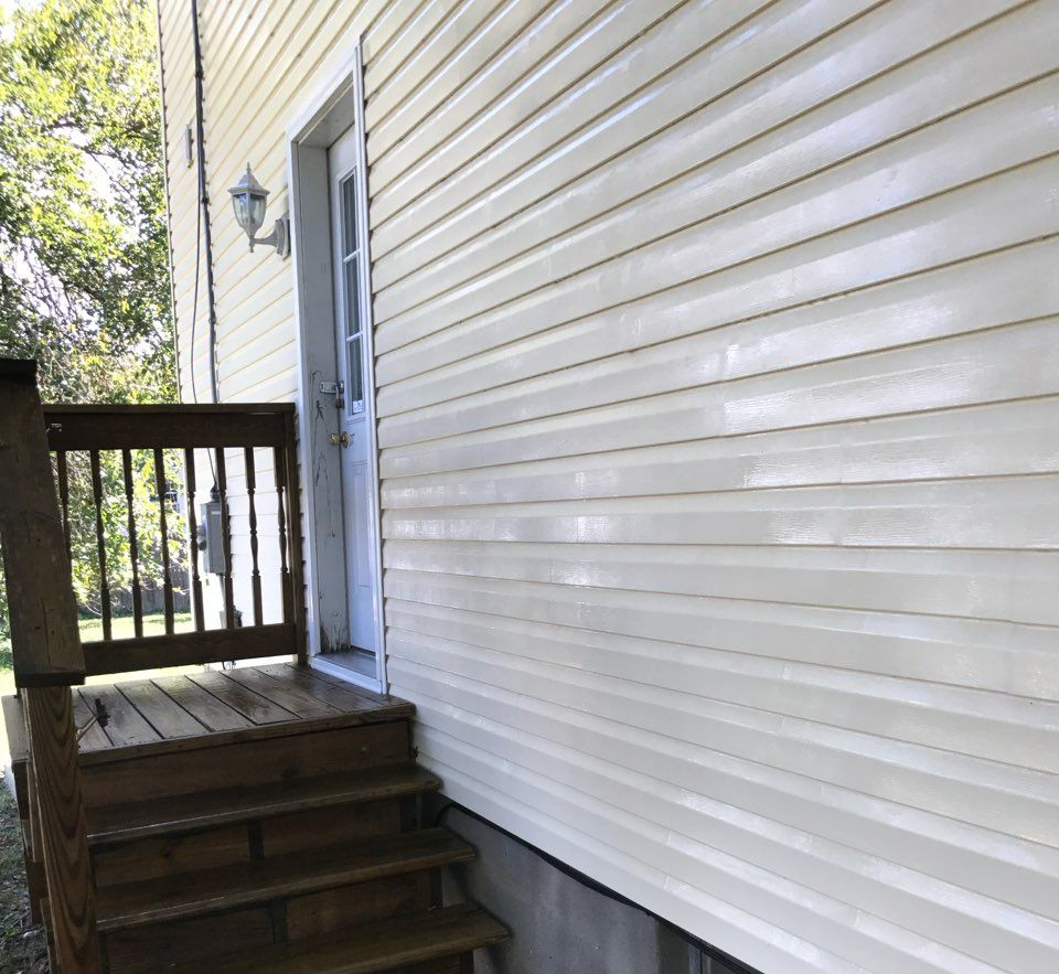 White horizontal siding planks.