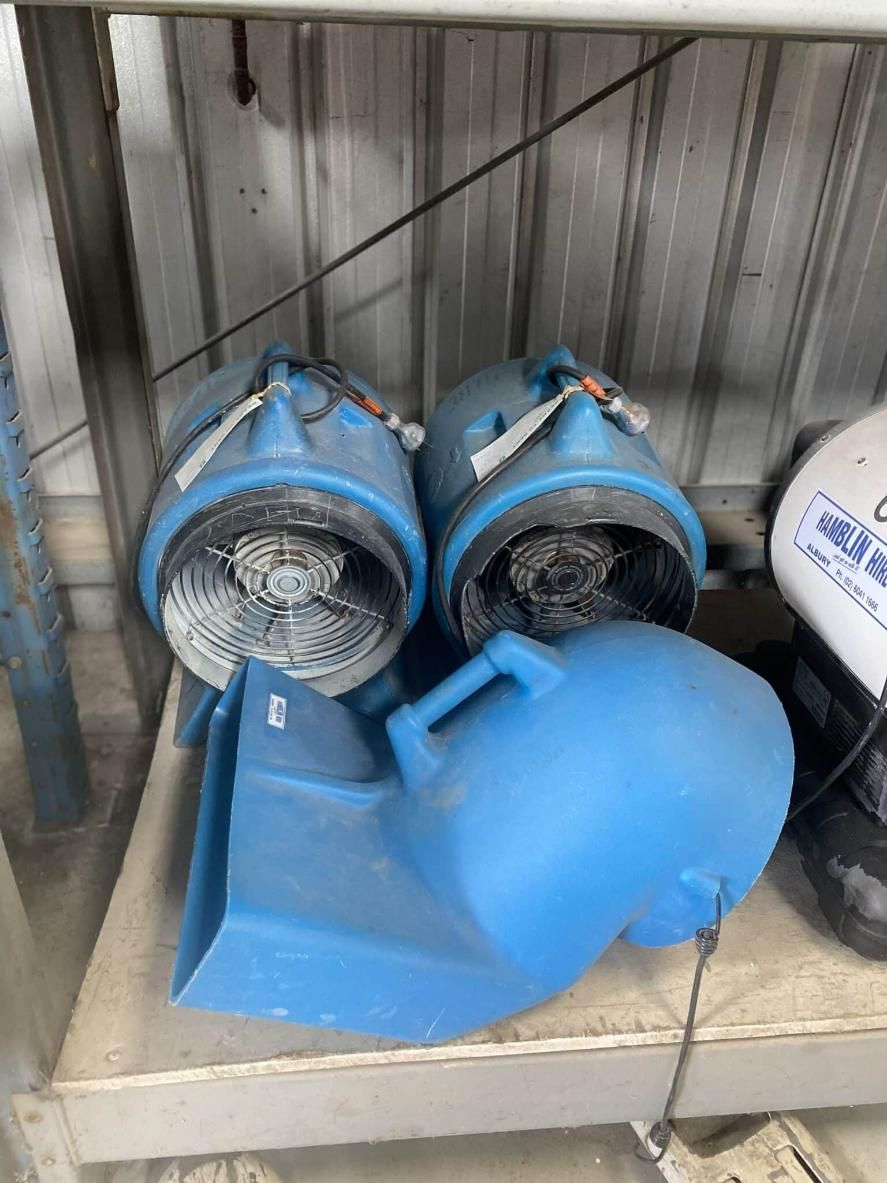 Two Blue Fans Are Sitting on Top of a Shelf — Hamblin Hire in Albury, NSW